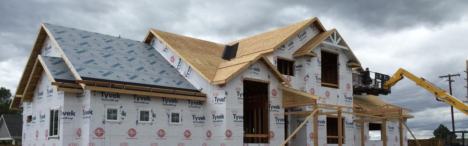 Wall and roof sheathing and tyvek titanium underlayment